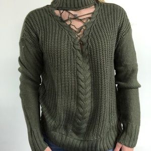 Army Green Sweater with detail on the front
